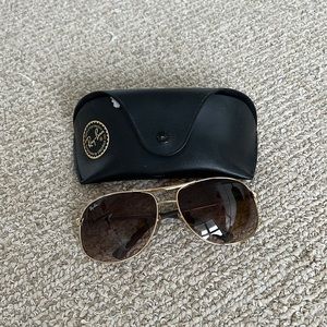 Rayban sunglasses.